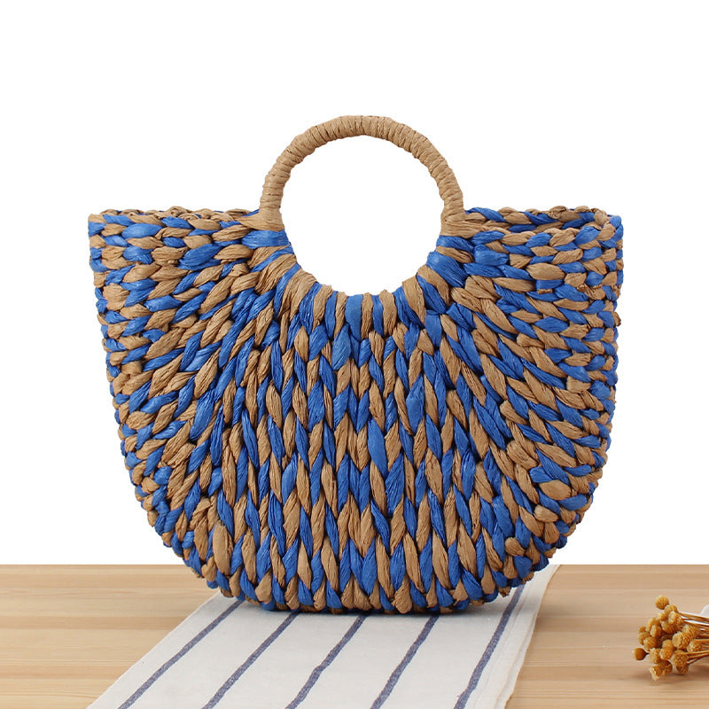 Wicker bag in modern design with artistic weaving Bowlift
