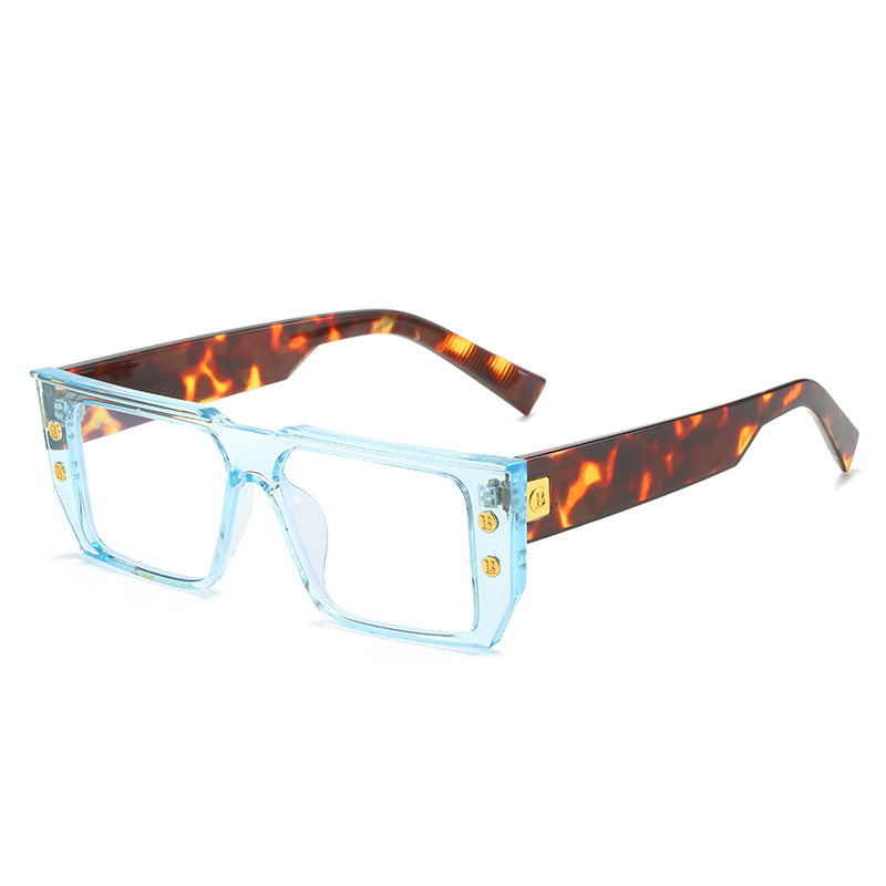 Women's fashionable clear glasses with golden accents Bowlift