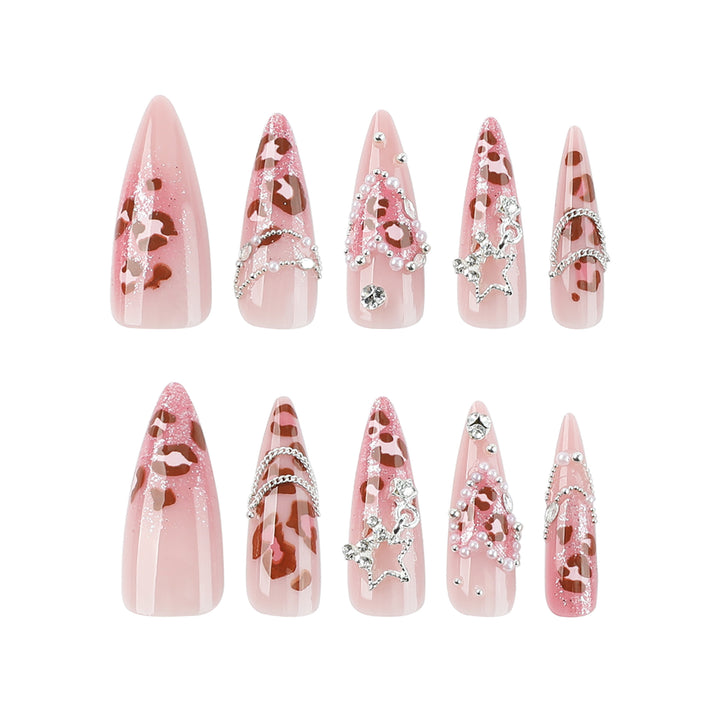 Artistic stiletto nails with glitter and jewelry accents Bowlift