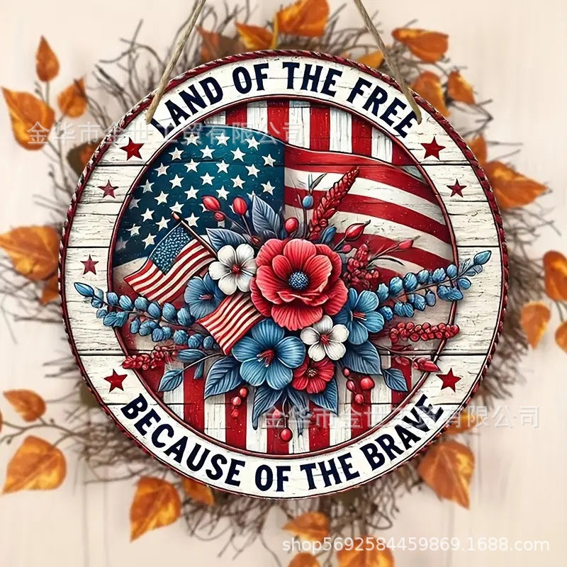 Independence Day rustic round wooden patriotic cross wall plaque with floral accents and God Bless America banner Bowlift