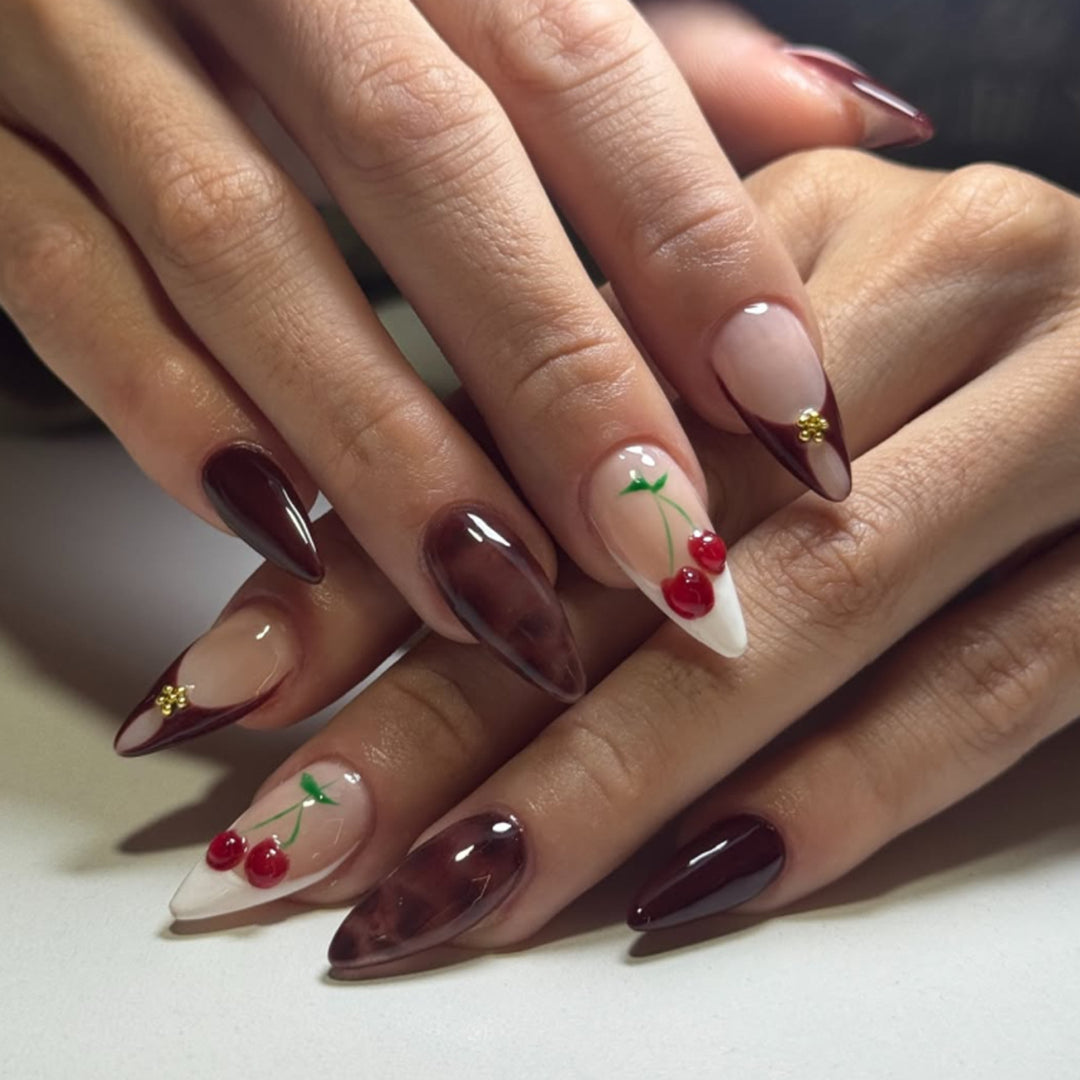 Artificial nail art with cherry blossom design Bowlift