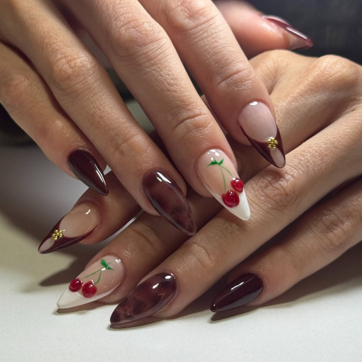 Artificial nail art with cherry blossom design Bowlift