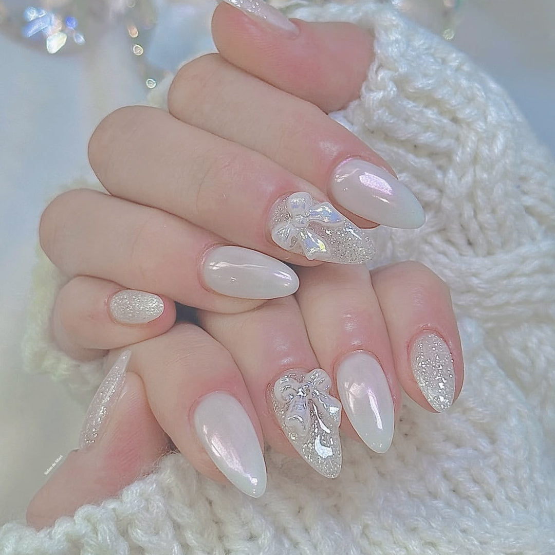 Elegant Stiletto Nail Art Extensions with 3D Bow Accents Bowlift