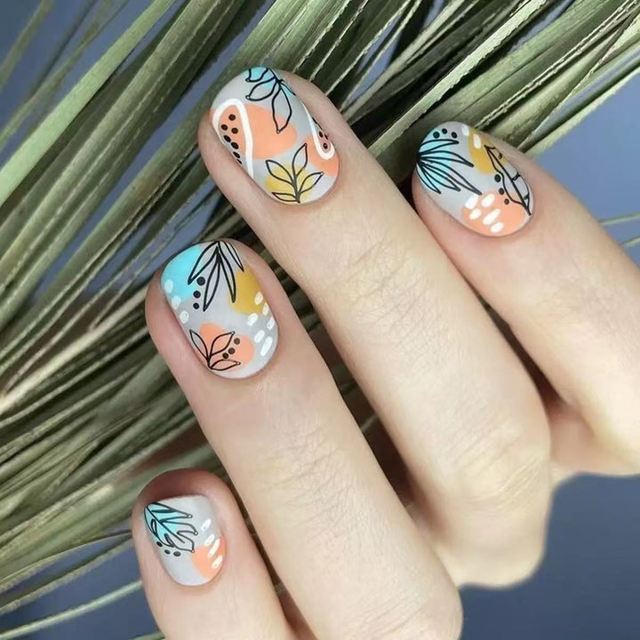 Nail art set with floral accents and creative design Bowlift