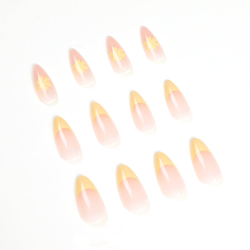 Artful nail designs with floral accents and gradient Bowlift