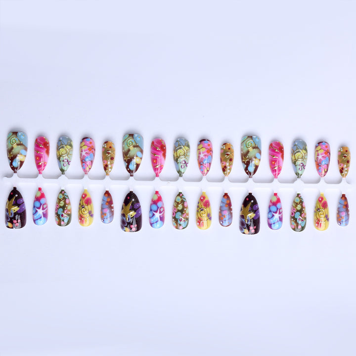 Artificial nails with handcrafted designs Bowlift