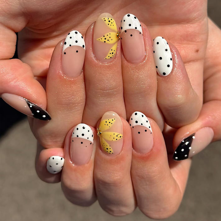 Artistic Press-On Nails with Floral and Polka Dot Designs Bowlift