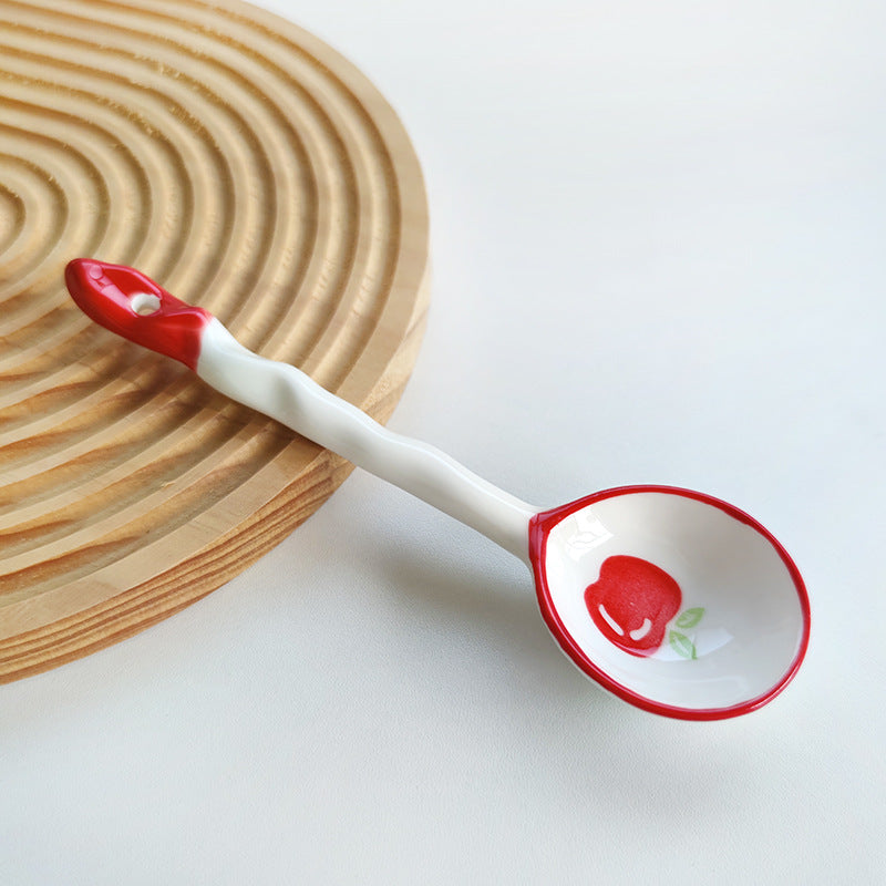 Ceramic soup spoon with lucky cat illustration and ergonomic long-handle Bowlift