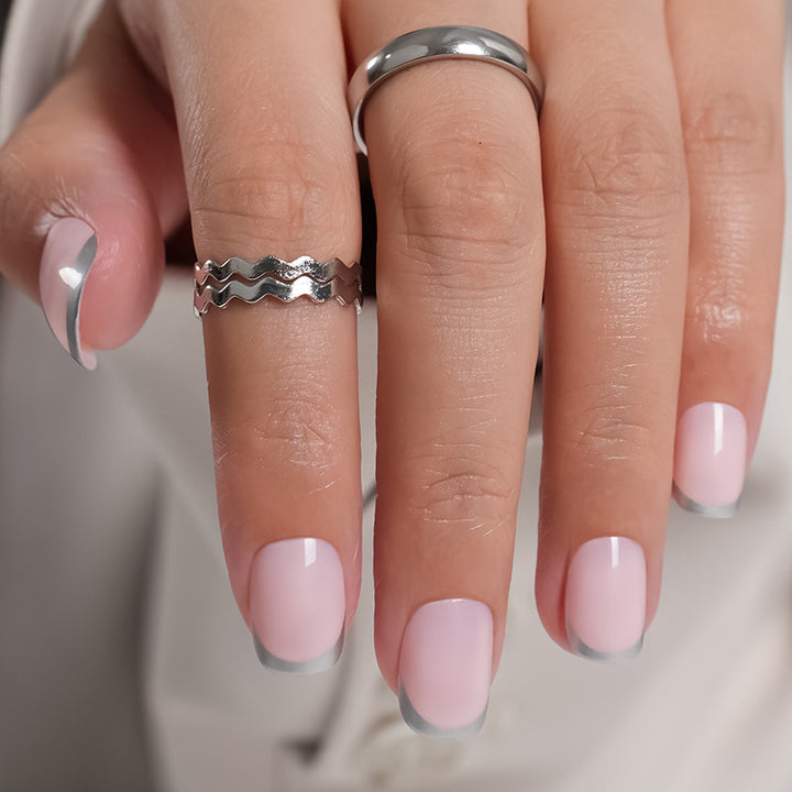 Artificial Nails in Natural French Tip Design Bowlift