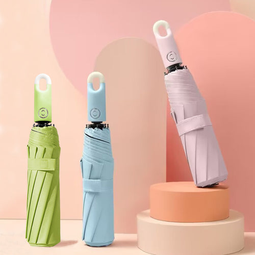 Women's elegant folding umbrella with ergonomic grip and UV protection Bowlift