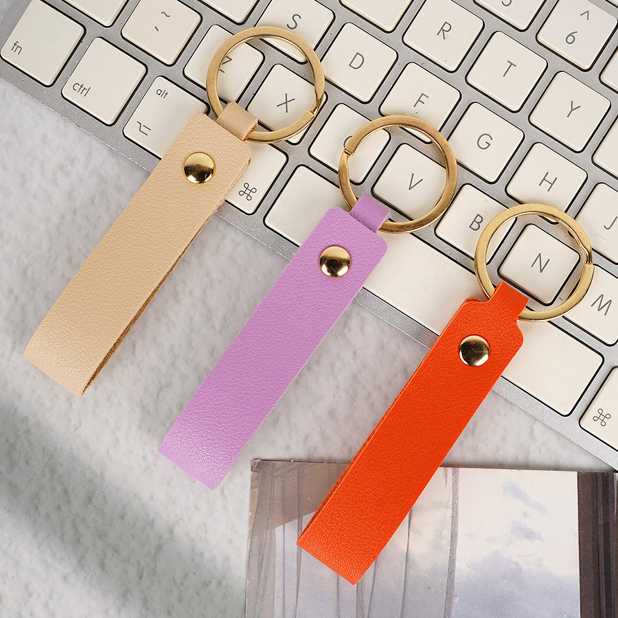 Unisex keychain made of high-quality artificial leather with practical loop Bowlift