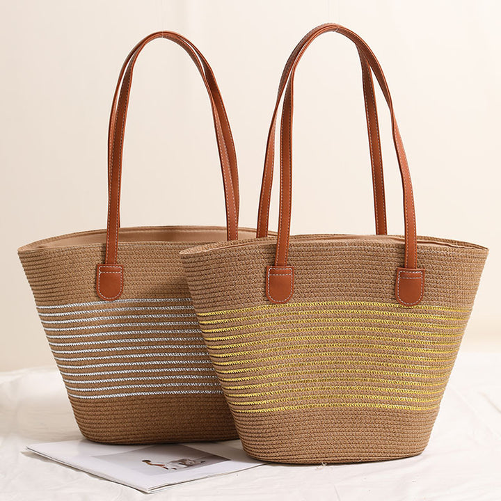 Elegant bast handbag with leather accents Bowlift