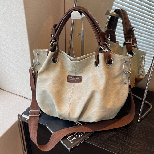 Everyday handbag with innovative carrying system Bowlift
