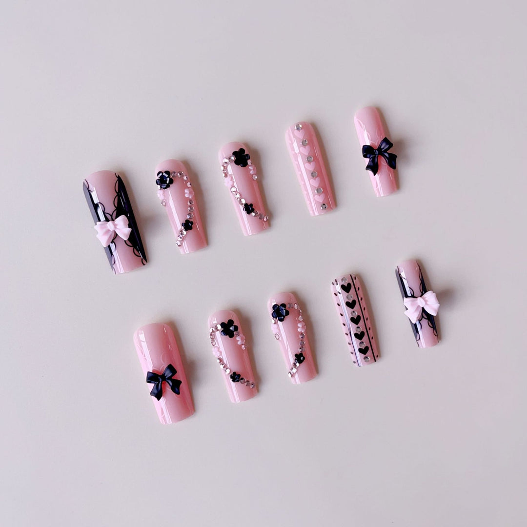 Fake nail set with playful 3D roses and elegant accents Bowlift