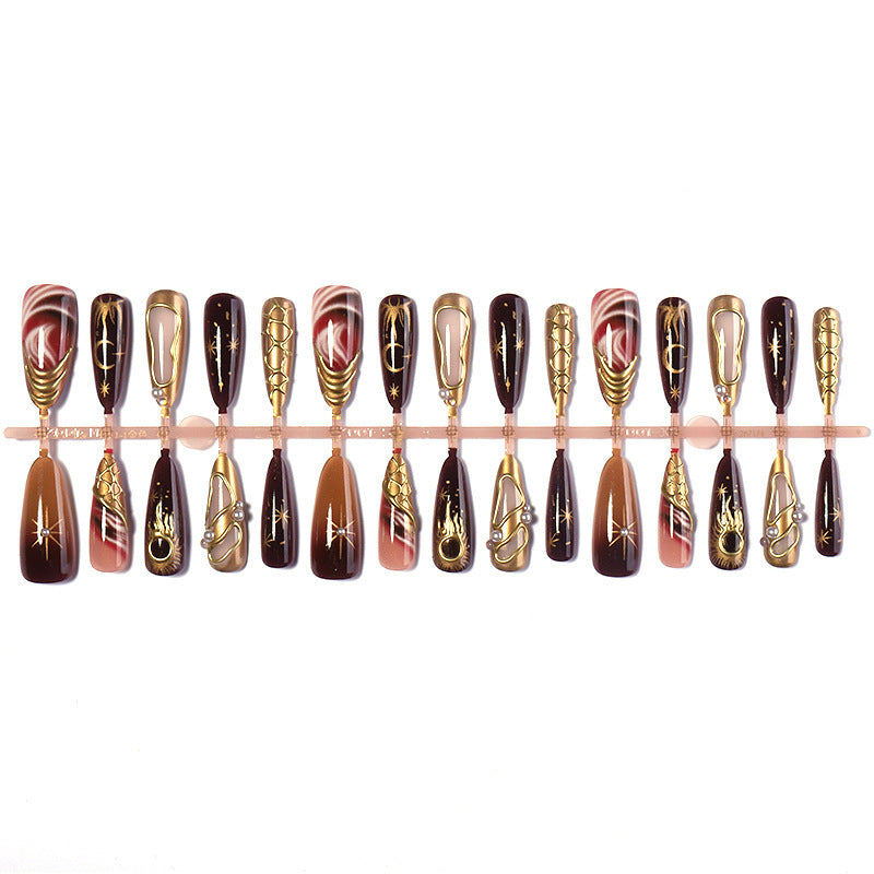 Artificial nail set with elegant gold accents and unique designs Bowlift