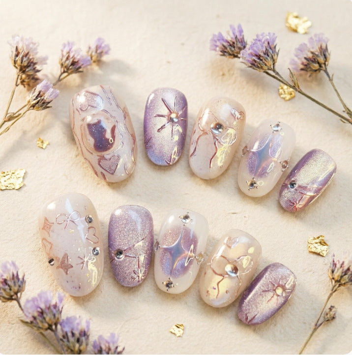Artificial nails with playful bow and star design Bowlift