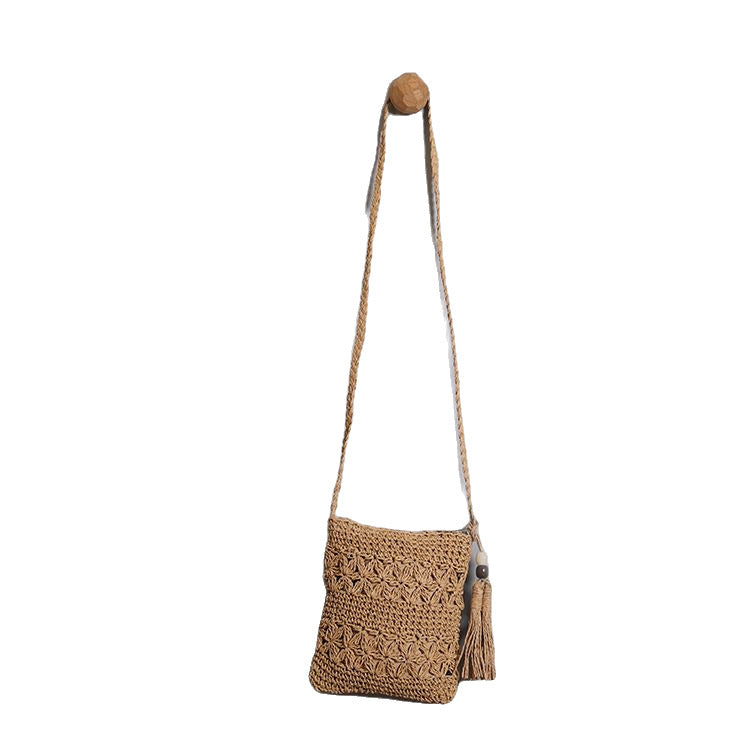 Handmade macrame shoulder bag with tassel detail Bowlift