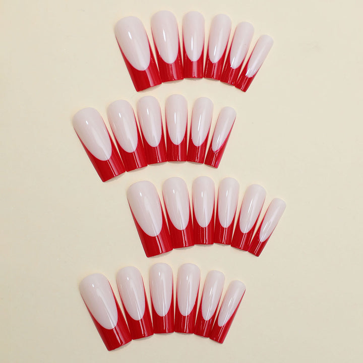 Elegant Press-On Nail Set with Artistic Red and White Design Bowlift
