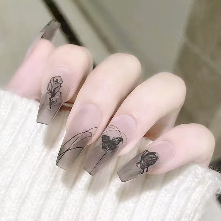 Artificial nail set with elegant flower design and delicate butterfly motifs Bowlift