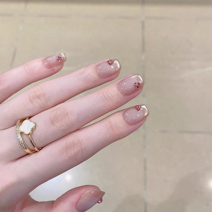 Artificial nails with elegant glitter accents Bowlift