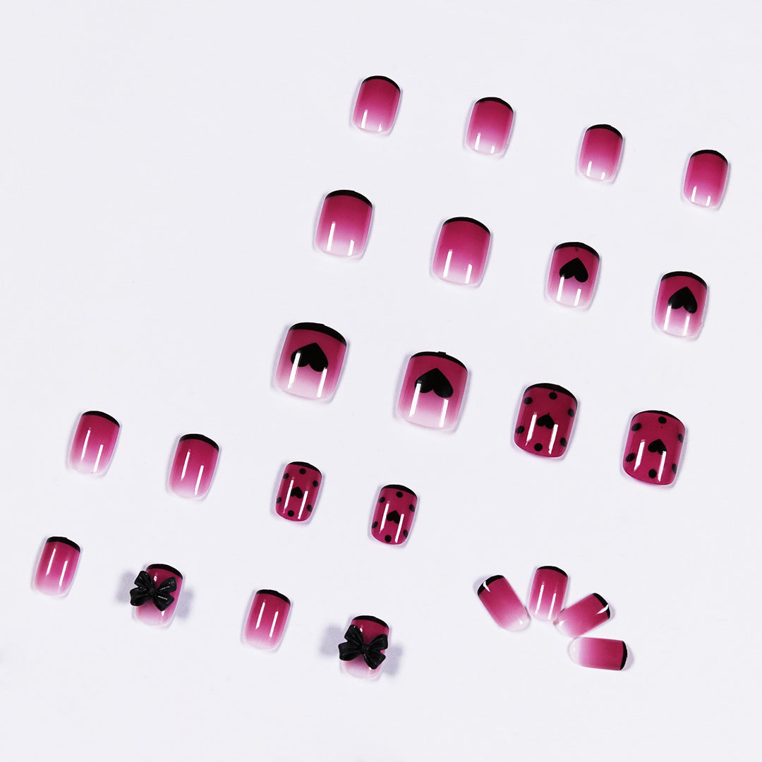 Artistic nail extensions with cute bow and heart designs Bowlift