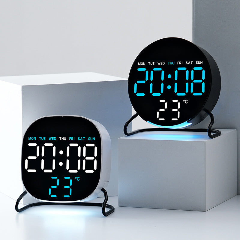 Digital alarm clock with temperature and calendar display Bowlift