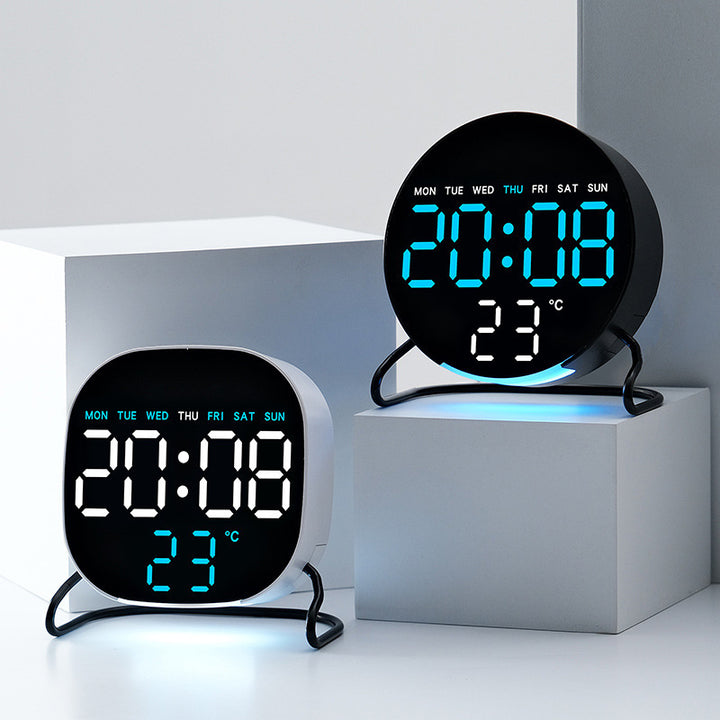 Digital alarm clock with temperature and calendar display Bowlift