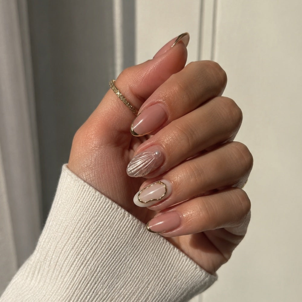 Artistic Press-On Nail Design with Gold Embellishments Bowlift