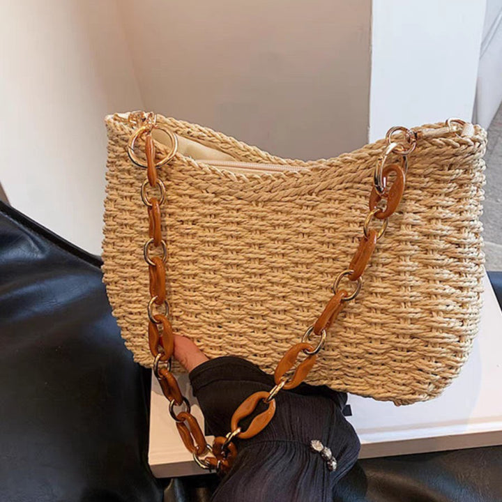Handbag with chain carry handle Bowlift