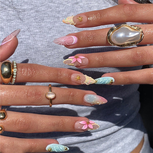Artificial nail set with elegant floral design and glitter accents Bowlift