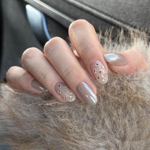 Elegant Nail Art with Rhinestone Accents Bowlift