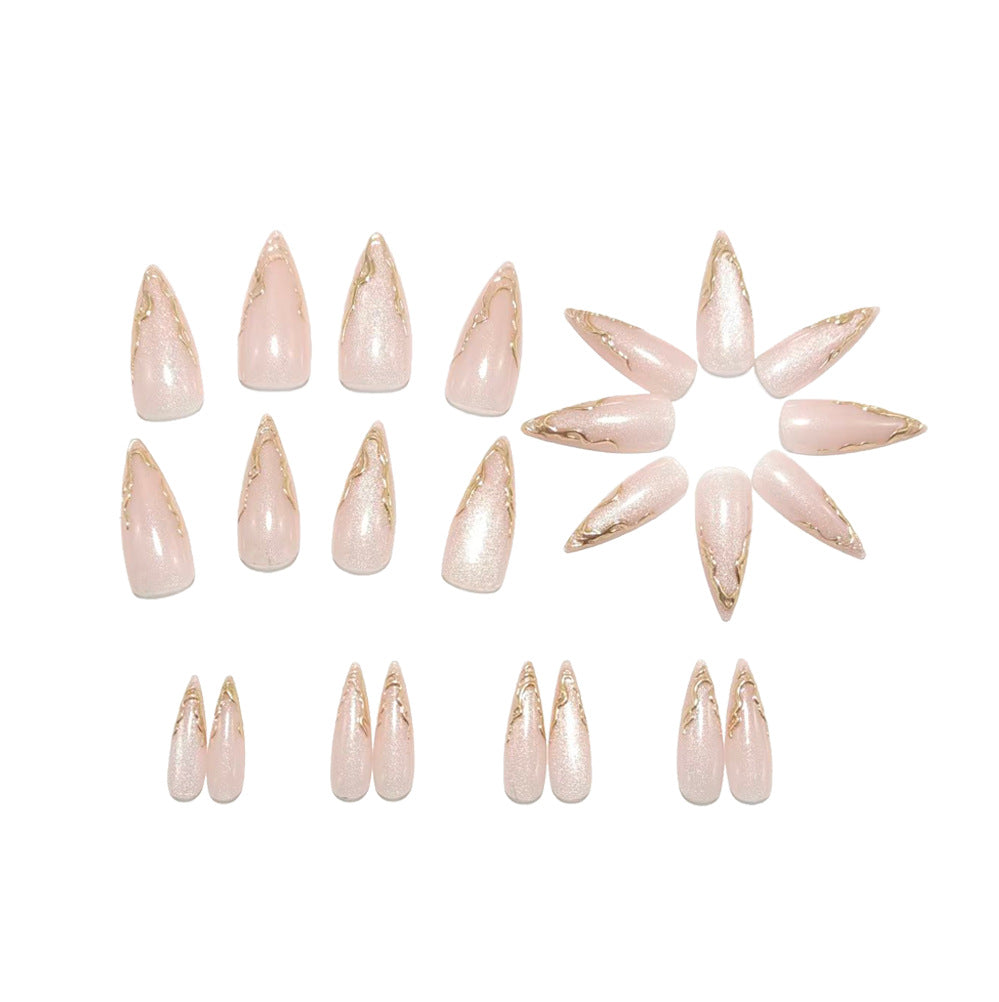 Artificial nails in elegant stiletto design with golden accents Bowlift