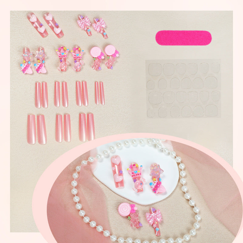 Creative nail art set with playful designs and glitter accents Bowlift