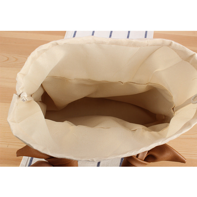 Basket bag with elegant fabric decoration Bowlift