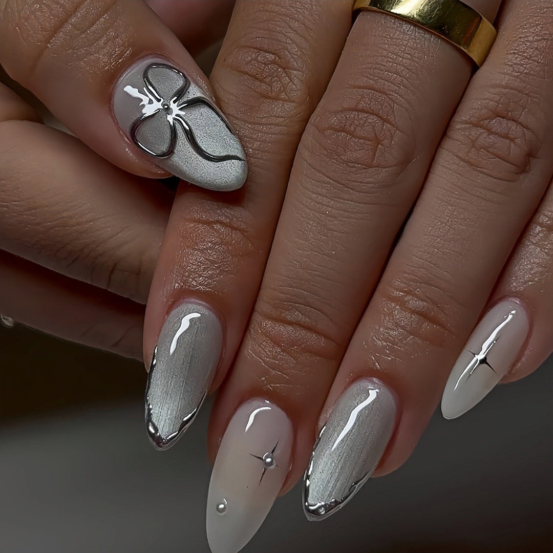 Elegant Stiletto Nail Art Extensions with Silver Accents Bowlift