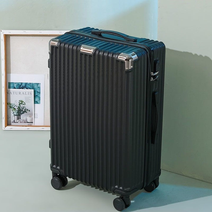 Hard shell suitcase with 360-degree wheel system and integrated safety feature Bowlift