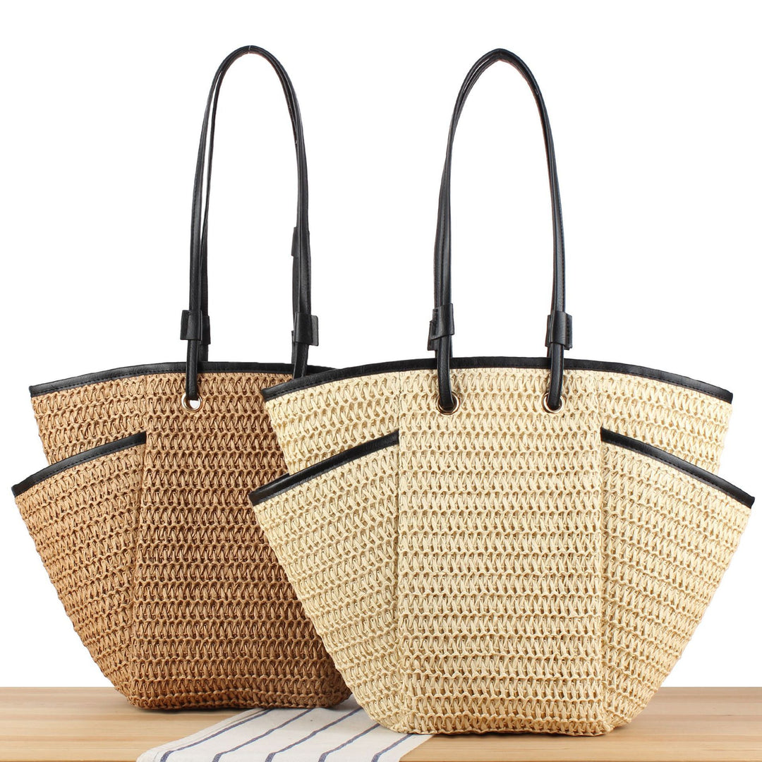 Tote bag with sophisticated compartment design and durable leather handles Bowlift