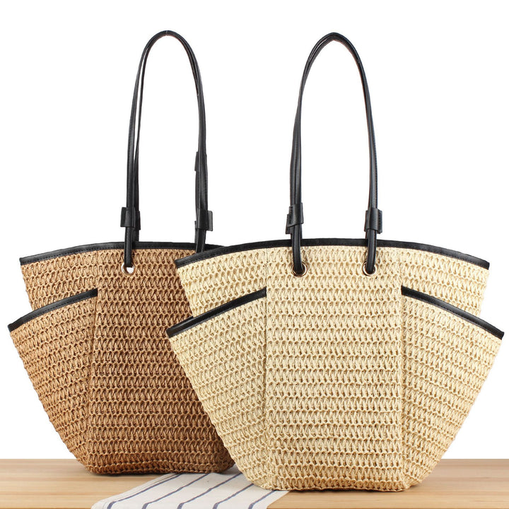 Tote bag with sophisticated compartment design and durable leather handles Bowlift
