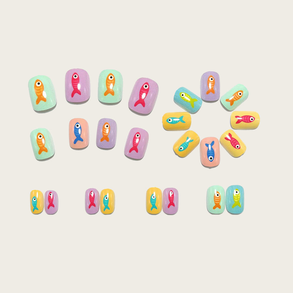 Creative artificial nails with playful fish design Bowlift