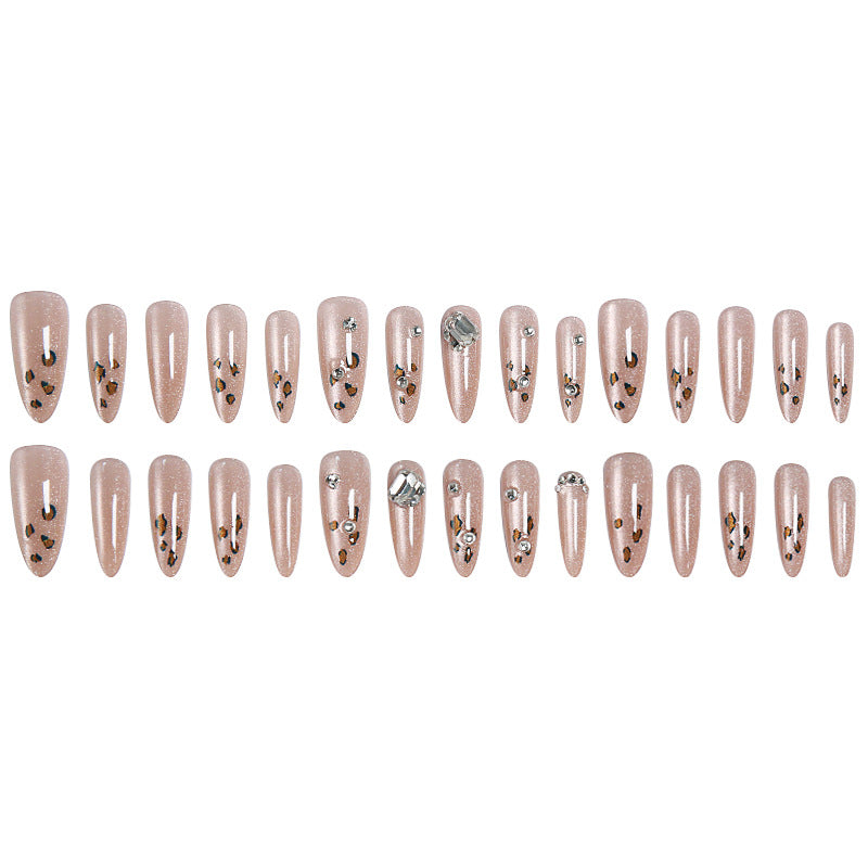 Glamorous artificial nail set with fun leopard pattern and glittering accents Bowlift