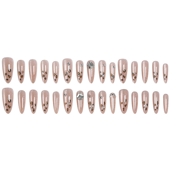 Glamorous artificial nail set with fun leopard pattern and glittering accents Bowlift