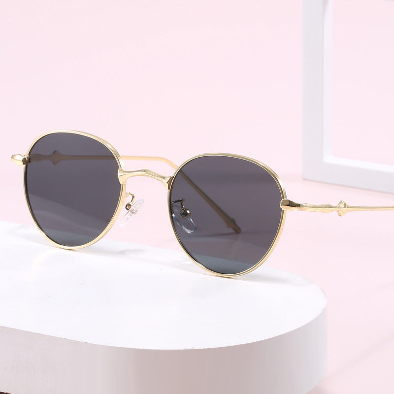 Ladies elegant round sunglasses with stylish metal frame Bowlift