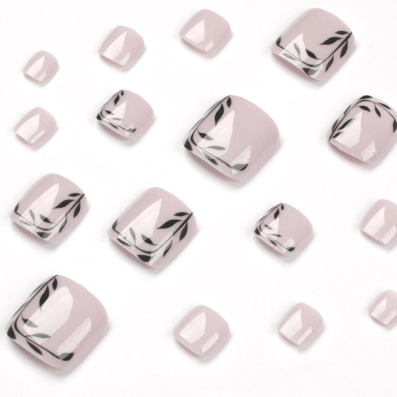Artful toenail art with delicate leaf motifs Bowlift