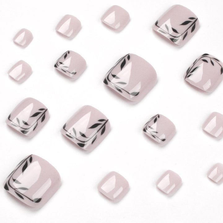 Artful toenail art with delicate leaf motifs Bowlift
