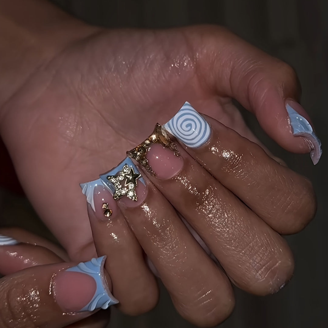 Artistic Long Press-On Nail Design with 3D Star Accents Bowlift
