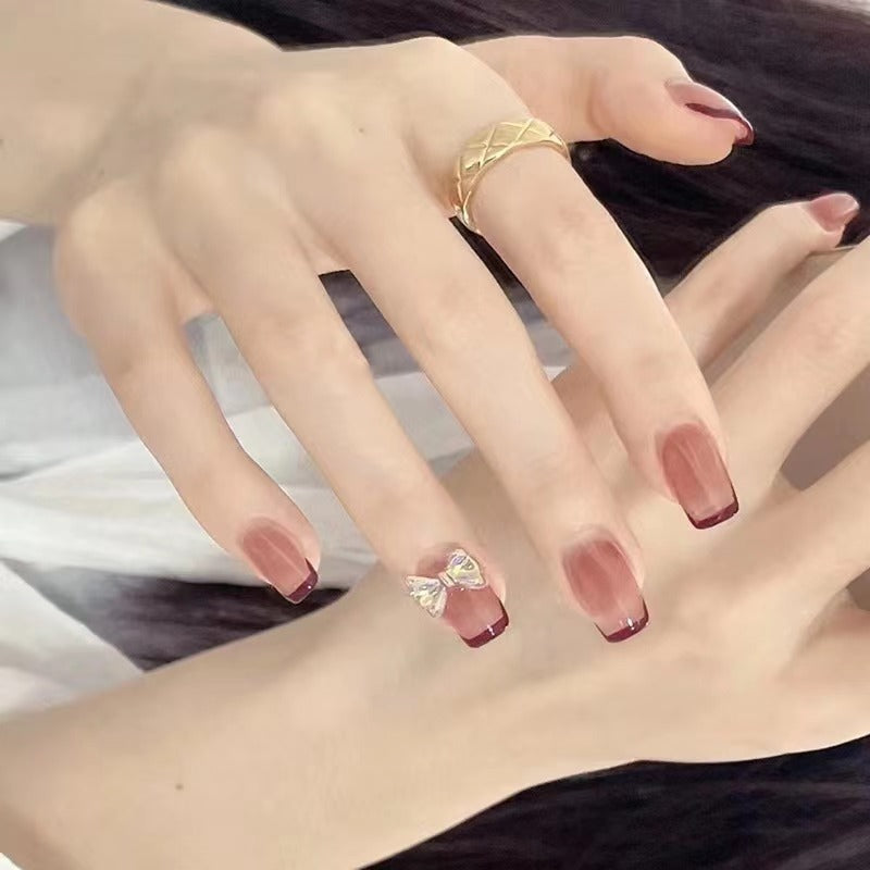 Elegant nail art with glitter accents Bowlift