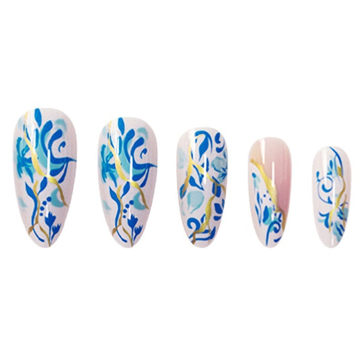 Artistic Floral Press-On Nail Design with Gold Accents Bowlift