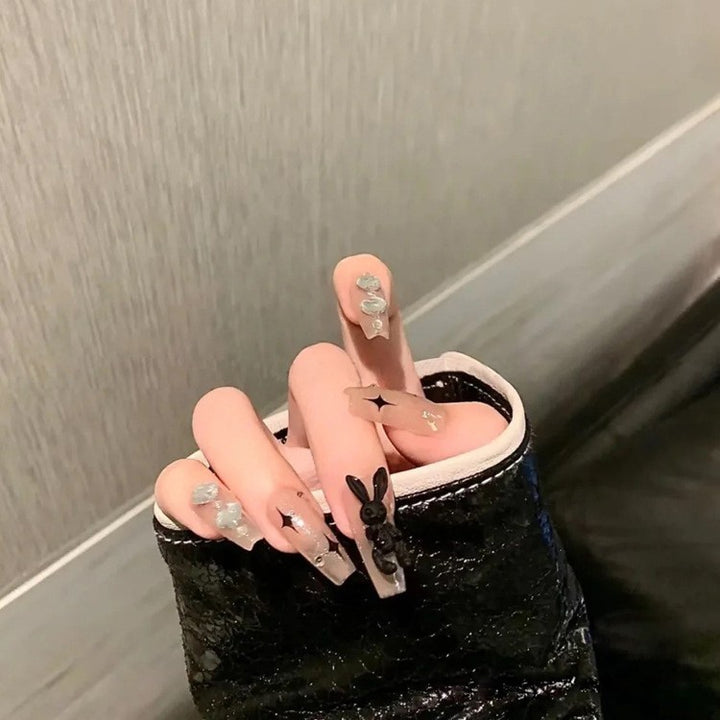 Artificial nails with decorative arches and pearls Bowlift