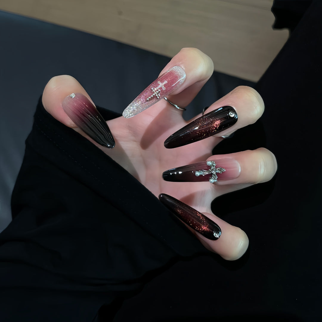 Glamorous artificial nails with shimmering color gradient and cross design Bowlift