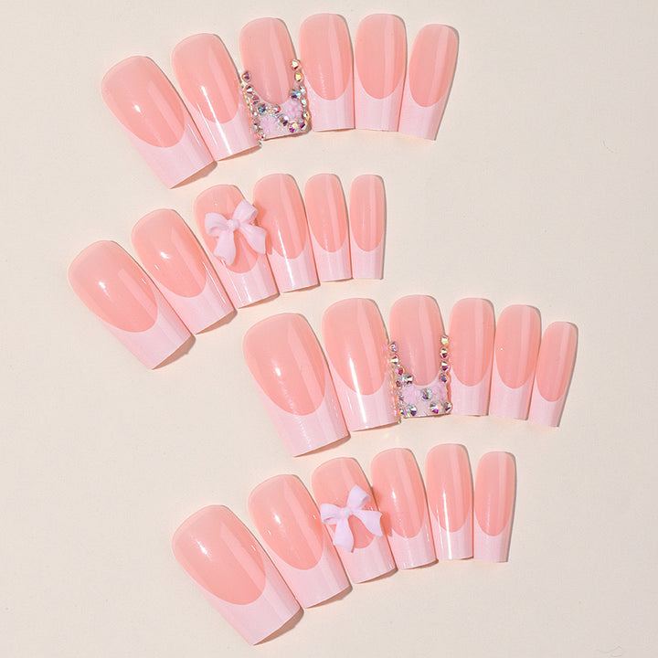 Artifical nail set with glamorous 3D bows and crystal embellishments Bowlift